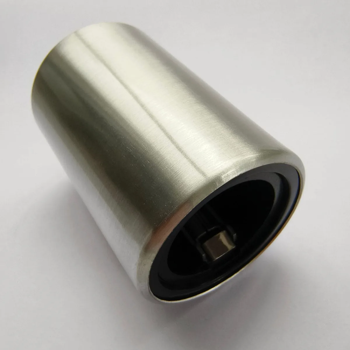 Additional angled view of the silver opener.